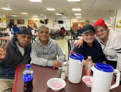 Residents enjoying time together in the dining room