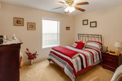 Cozy bedroom with a bed and decorative items