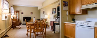 Cozy living space with dining area and kitchen