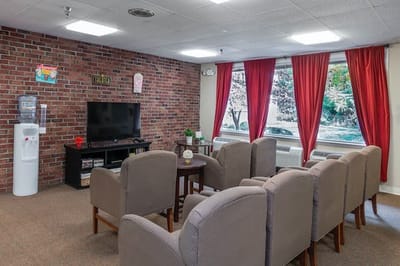 Common area with seating and view of the outdoors