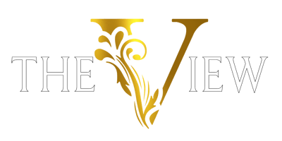 Gold and white logo for The View