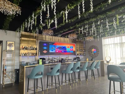 Interior of a stylish bar area with seating
