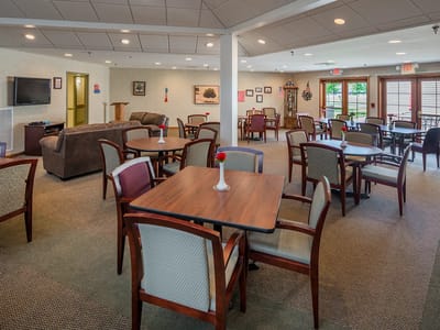 Interior view of a common area with seating and tables