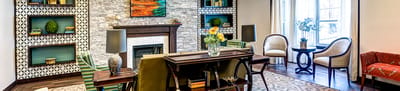 Bright common area with comfortable seating and decor