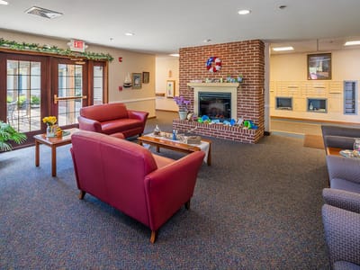 Comfortable common area with seating and fireplace
