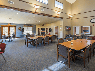 Interior view of a common area with tables and chairs