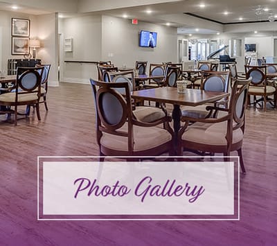 Dining area with tables and chairs in a common area