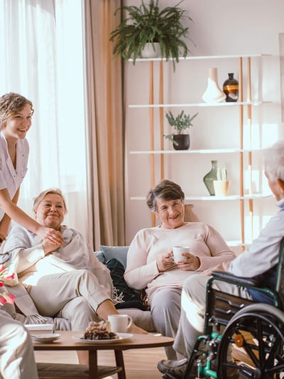Residents enjoying time together in a cozy living room