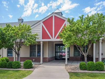 Exterior view of Luther Crest Apartments with landscaping