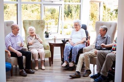 Residents enjoying time together in a lounge area