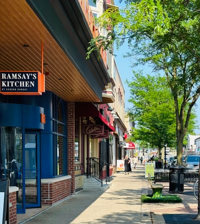 Outdoor view of a street with dining establishments