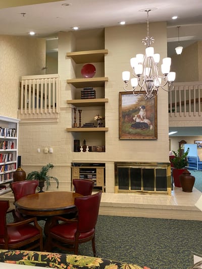 Interior common area with seating and fireplace
