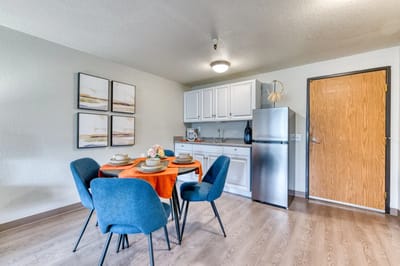 Bright interior of a resident's kitchen and dining area