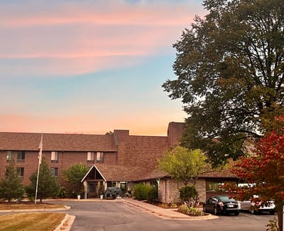 Exterior view of the facility at sunset
