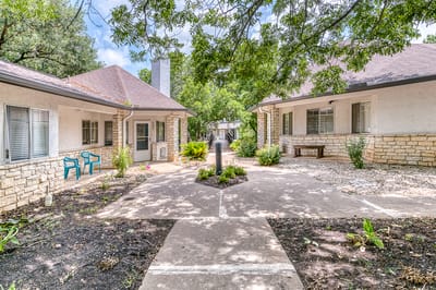 Outdoor courtyard with seating and pathways