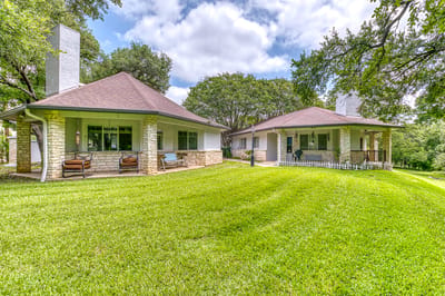 Exterior view of senior living cottages surrounded by grass