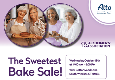 Residents and staff at a bake sale event