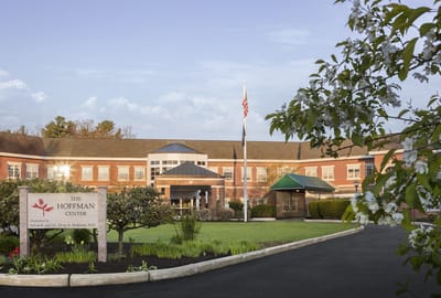 Exterior view of The Hoffman Center with manicured grounds