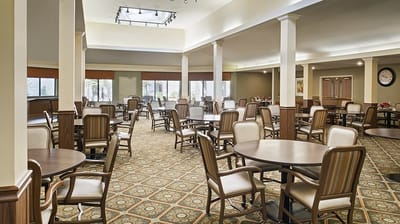 Bright dining room with tables and chairs