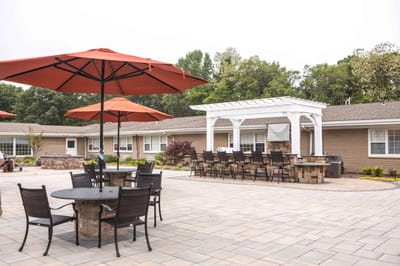 Outdoor seating area with umbrellas and patio