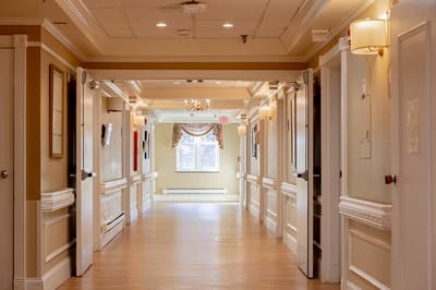 A well-lit hallway in the facility