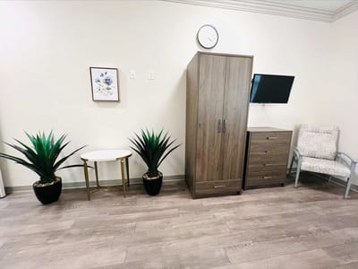 Private room with furniture and plants