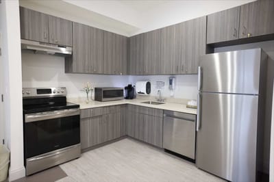 Modern kitchen space with stainless steel appliances
