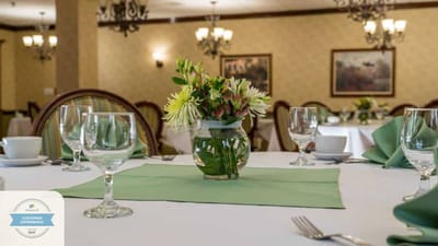 Beautifully set dining table in an elegant dining room