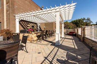 Outdoor patio area with seating and pergola