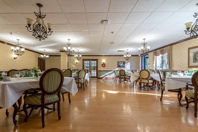 Dining area with tables and decorative lighting