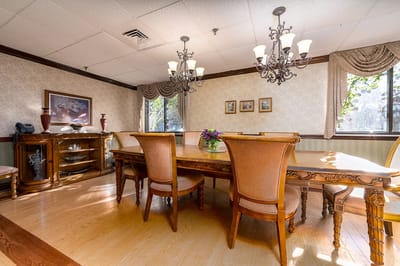 Elegant dining room setup with large table and chairs