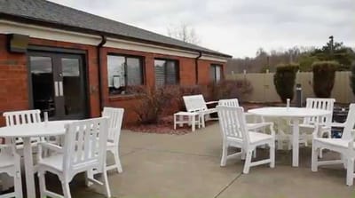 Outdoor seating area with white furniture