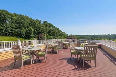 Outdoor seating area with tables and views