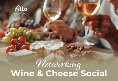 Residents enjoying wine and cheese at a social event