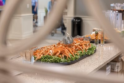 A beautifully arranged crab dish in a dining area.