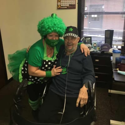 Two residents celebrating in festive attire
