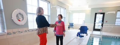 Wellness activity in a bright indoor pool area