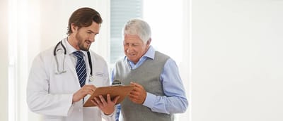 A doctor discussing with a senior resident