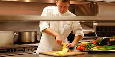 Chef preparing fresh ingredients in the kitchen