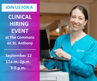 Staff member smiling during a clinical hiring event