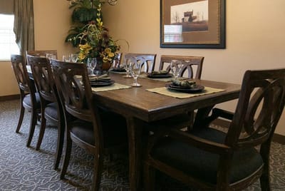 Elegant dining room setup with floral centerpiece