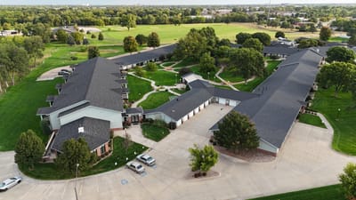 Aerial view of Riverside Lodge Retirement Community campus and grounds