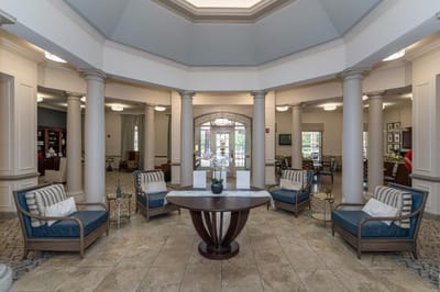Interior view of a bright common area with seating