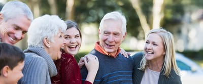 Residents and staff enjoying time together outdoors
