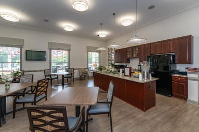 Bright dining area with seating and kitchen counter
