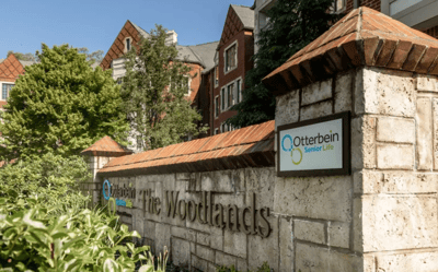 Exterior view of Otterbein facility signage and landscaping