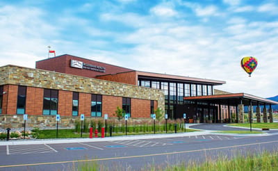 Exterior view of Bozeman Health Hillcrest with a hot air balloon.