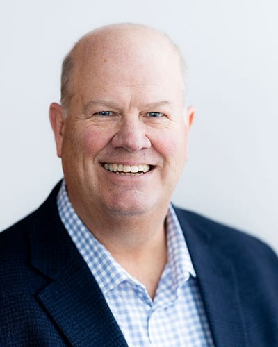 Smiling man in a blazer
