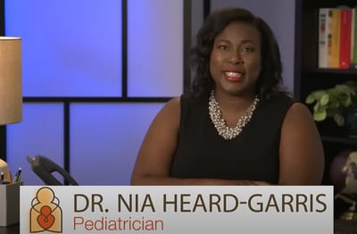 Pediatrician Dr. Nia Heard-Garris speaking in an office