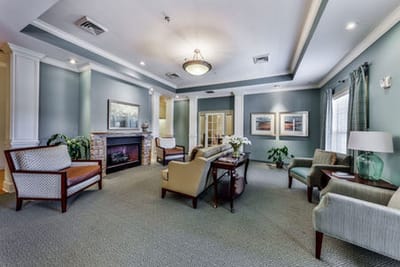 Interior common area with seating and fireplace